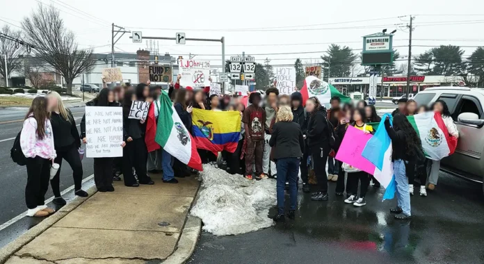 Bensalem High Students Walk Out Over ICE Bensalem High School students march along Hulmeville Road during ICE protest walkout